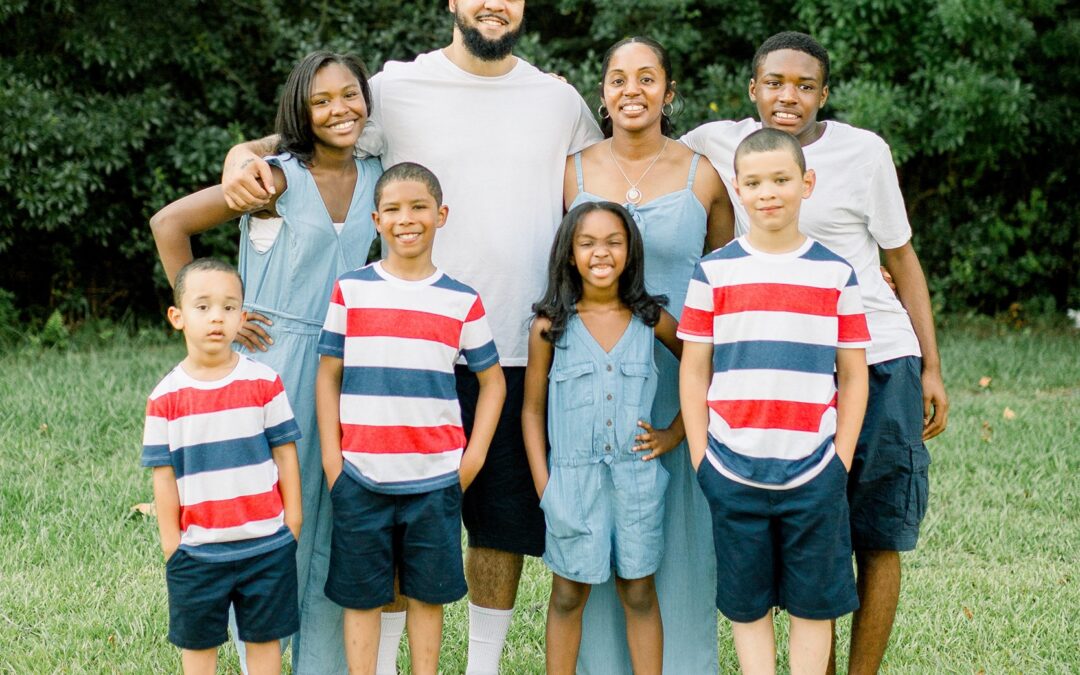 Faith-based blended military family photo with autism awareness